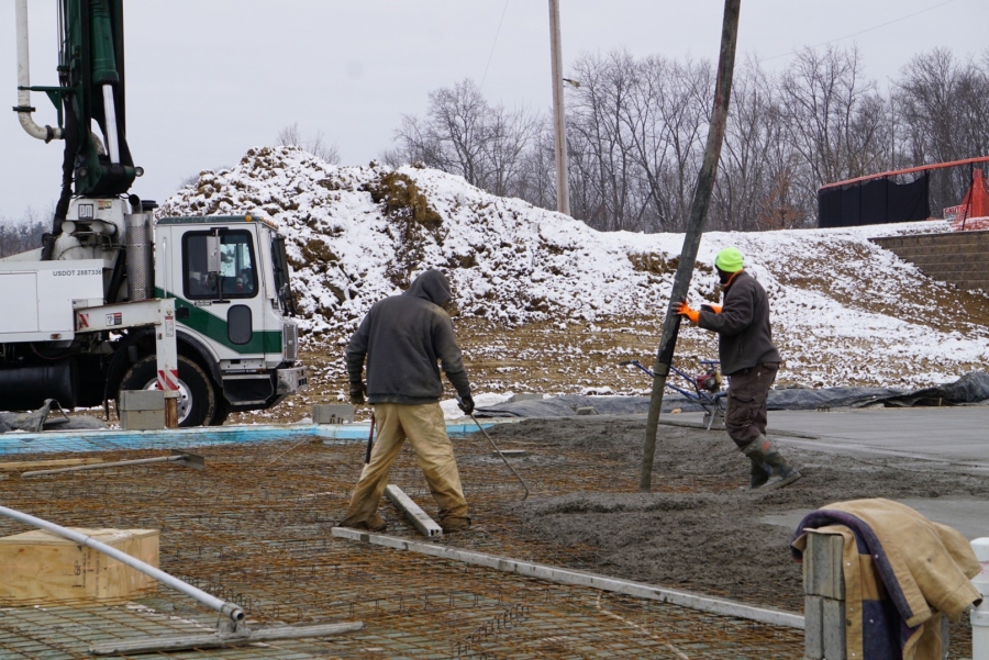 concrete pump dispensing conrete